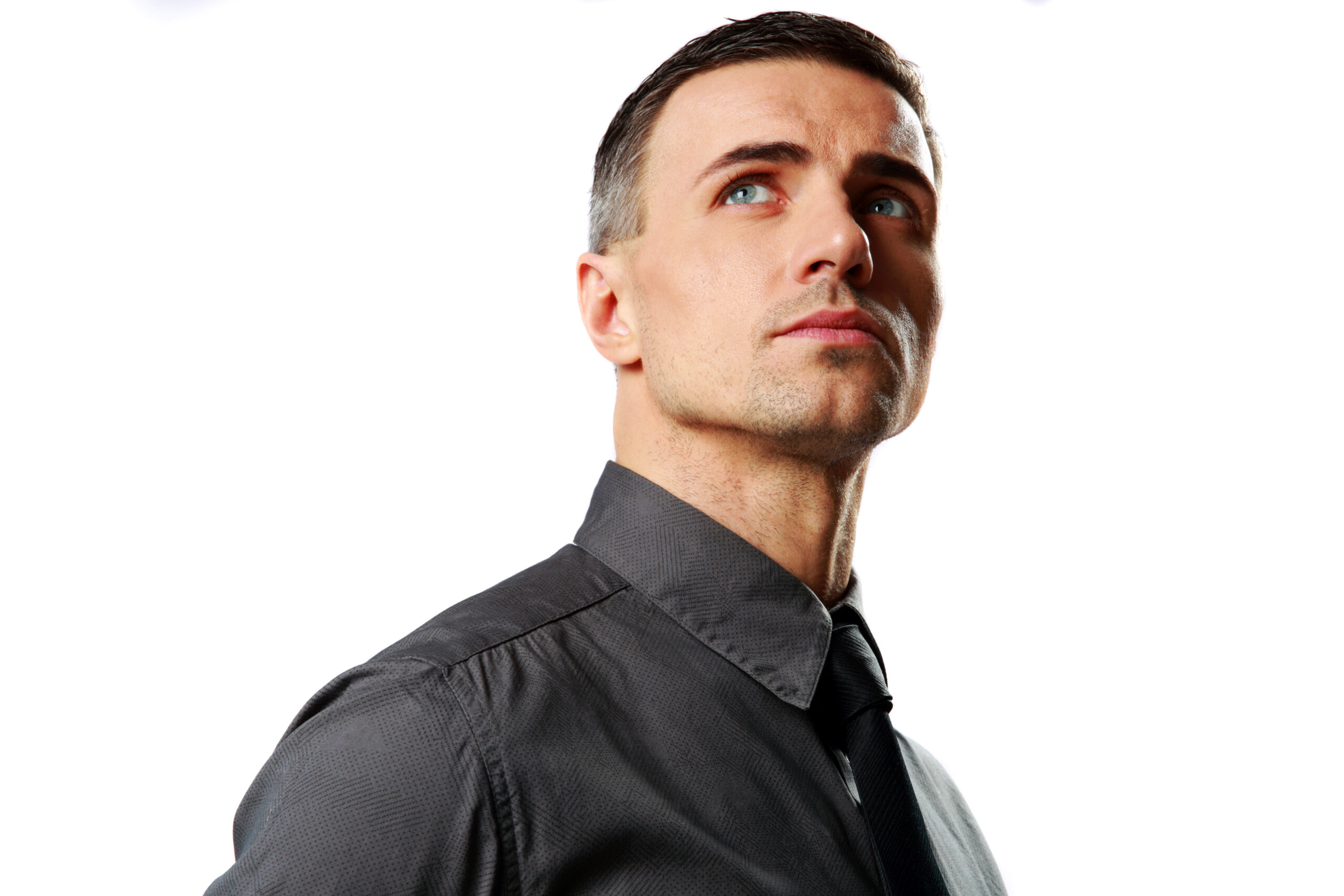 From Dependent to Unstoppable: Building Confidence and Self-Sufficiency 3 portrait of a confident businessman looking up isolated on a white background scaled