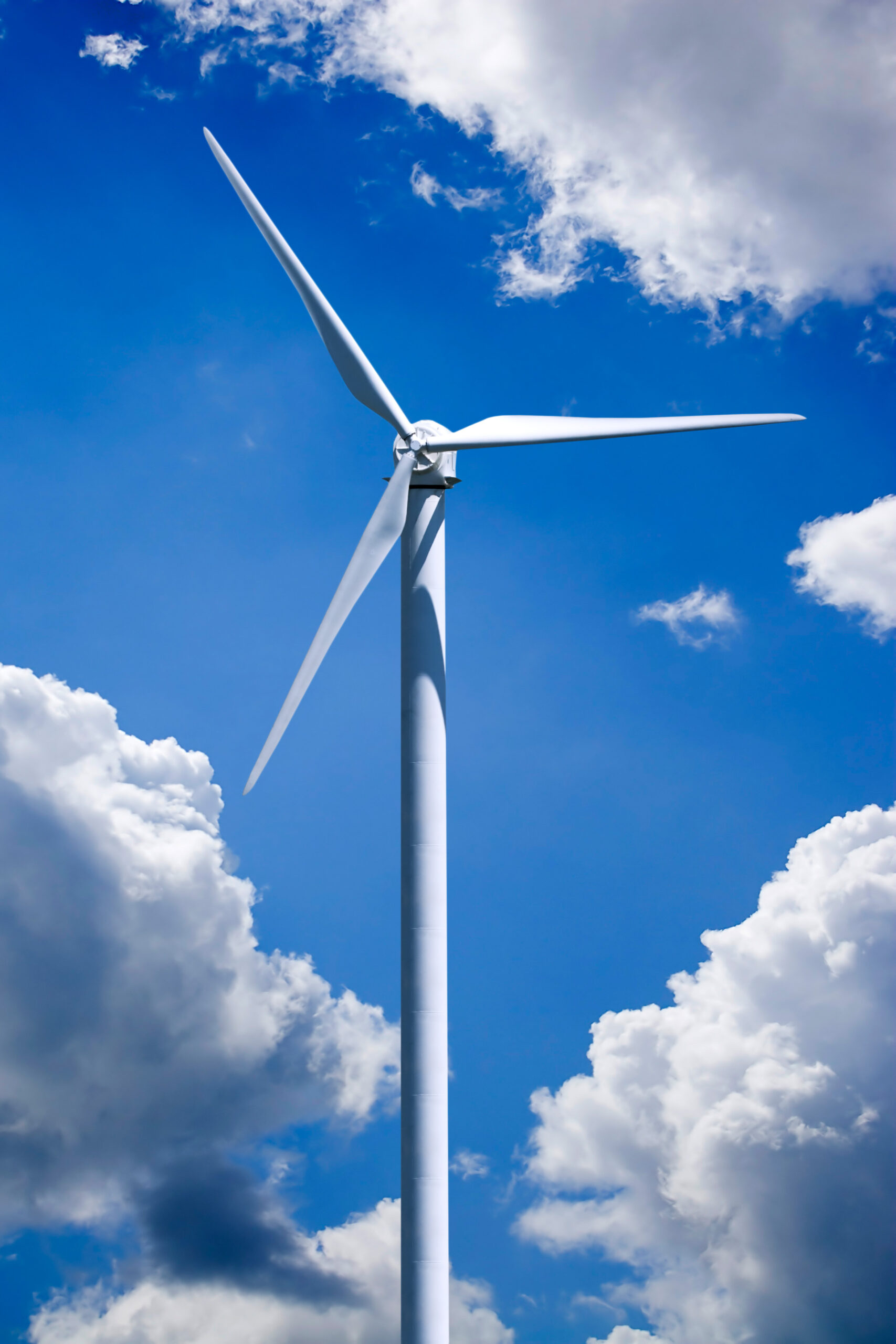 The Power of One: Mastering Modern Self-Reliance 3 a single wind turbine over a cloud filled blue sky clipping path is included for easy isolation of the turbine HtJr Ari scaled